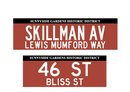 Two replica street name signs for Sunnyside Gardens Historic District, one indicating 'SKILLMAN AV LEWIS MUMFORD WAY' and the other indicating '46 ST BLISS ST'. Both signs have a red background with white text.