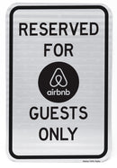 Airbnb reserved parking sign for guests front