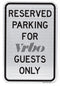 VRBO reserved parking sign for guests front