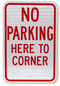 No Parking Here to Corner Sign
